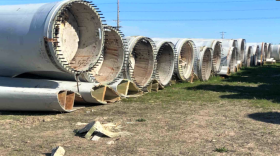 State environmental officials are asking the attorney general to investigate a Washington state-based company that has failed to recycle old wind turbine blades stored in Newton, Ellsworth and Atlantic.