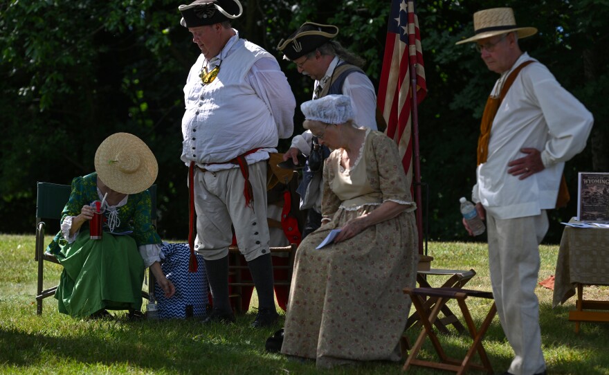 Members of the 24th Connecticut Militia Regiment dress the part during the ceremony.