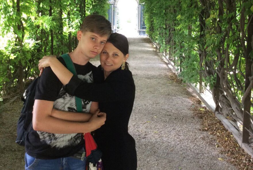 Anton Prima, a student at Ukrainian American Concordia University, is pictured with his mother.