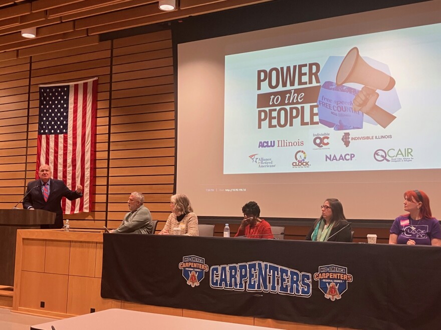 A panel of speakers listens to Ed Yohnka, ACLU of Illinois' director of communications and public policy, at the "Power to the People" event Jan. 13, 2026 in East Moline.