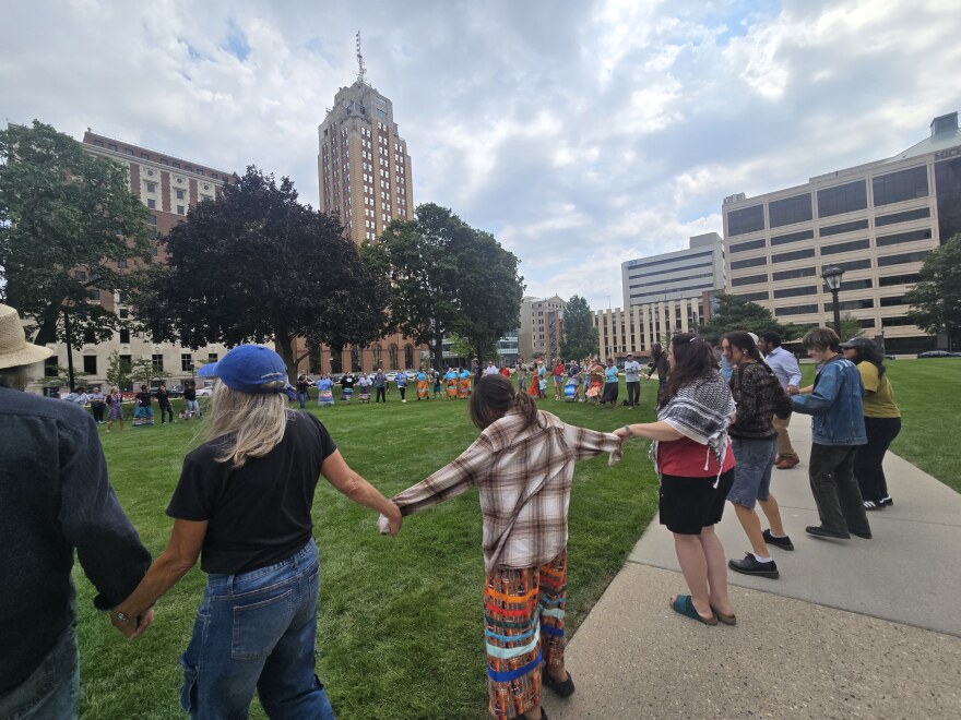 Activists, including tribal community members, opposed to the operation of the Line 5 oil and natural gas liquids pipeline, rally at the Michigan Capitol on Wednesday, August 27.