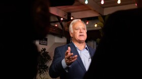 Kirk Watson is interviewed by media at an election night watch party on Tuesday.