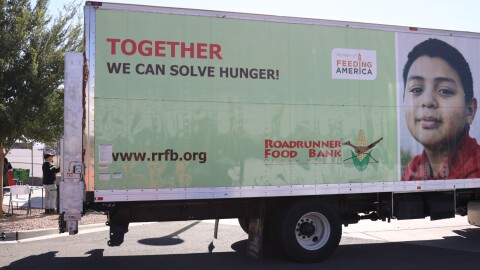 A semi trailer full of Roadrunner Food Bank food sits in front of a weekly distribution in Albuquerque’s International District on Sept. 12, 2025. Members of New Mexico’s congressional delegation say the USDA has plenty of funding to pay for SNAP in November, despite officials’ claims.