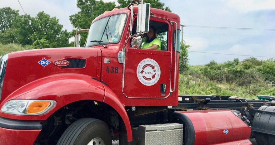 Amy Schirf, education coordinator at the Centre County Recycling and Refuse Authority, in one of the authority's trucks.