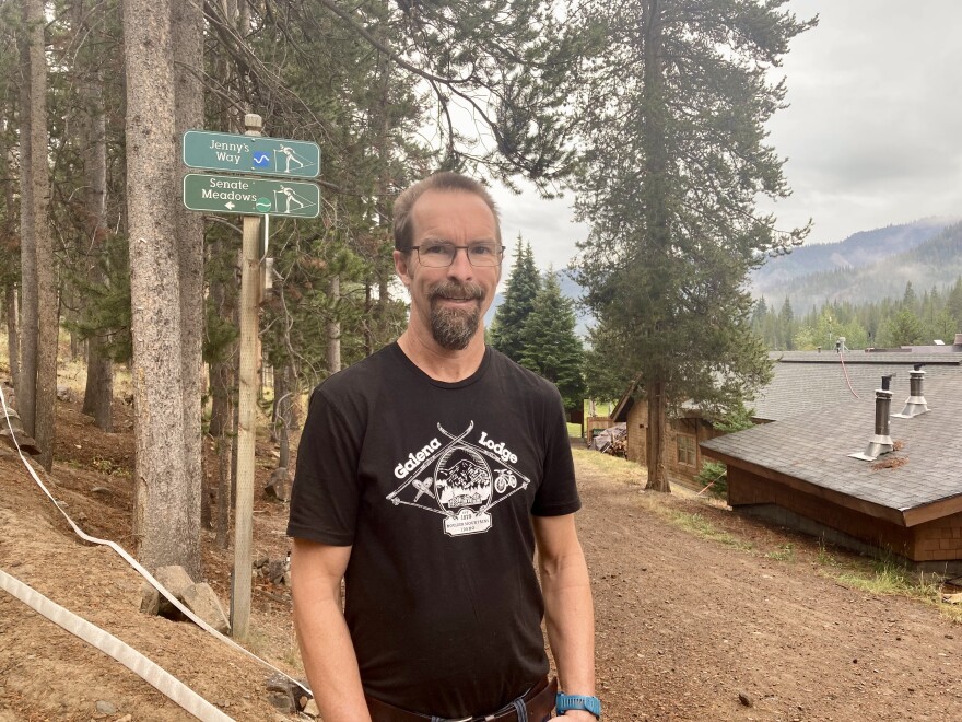 Don Shepler, the manager of Galena Lodge, stands in front of a cross-country ski trail.