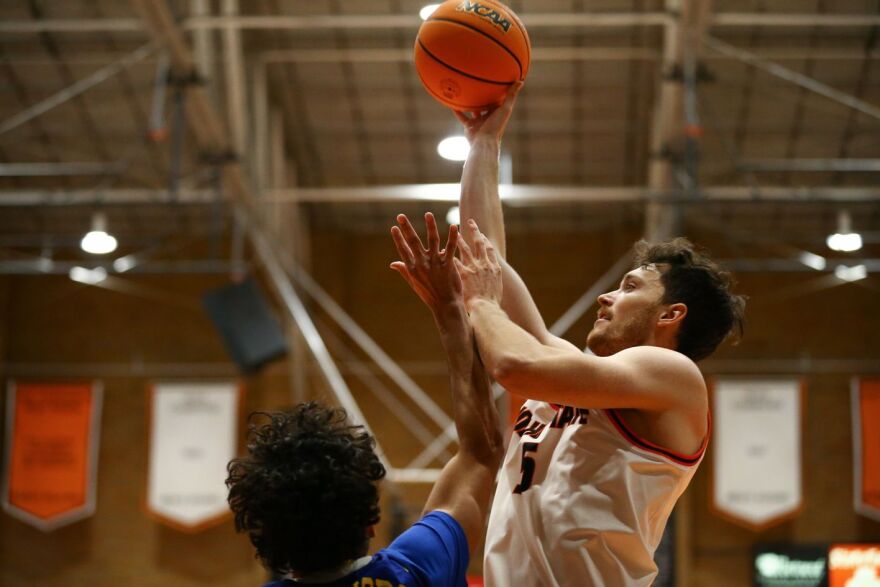 Men's Basketball team in action