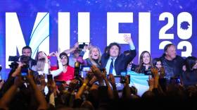 Javier Milei, presidential candidate of the Liberty Advances coalition, embraces his sister Karina at his campaign headquarters after polling stations closed during primary elections in Buenos Aires, Argentina. (Natacha Pisarenko/AP)