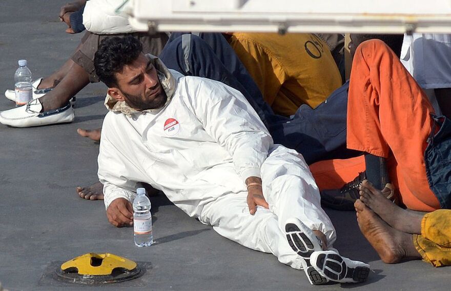 Tunisian national Mohammed Ali Malek, one of the survivors and understood to be the captain of the boat that overturned off the coast of Libya, sits on board the Italian Coast Guard vessel Bruno Gregoretti after he was rescued in April 2015.