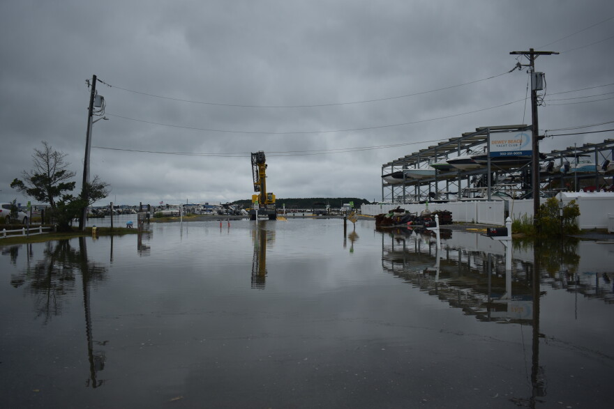 The parking lot and road into the Dewey Yacht Club and associated pier is flooded following an early fall nor'easter.