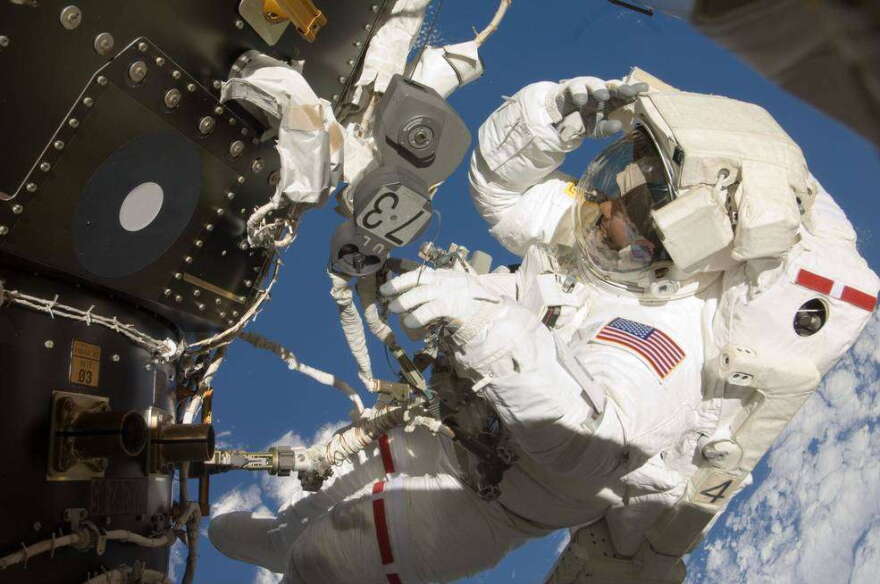 Astronaut Tom Marshburn, STS-127 mission specialist, participates in his first spacewalk and the second overall for the crew members of the Space Shuttle Endeavour and the International Space Station, July 20, 2009. Photo: NASA