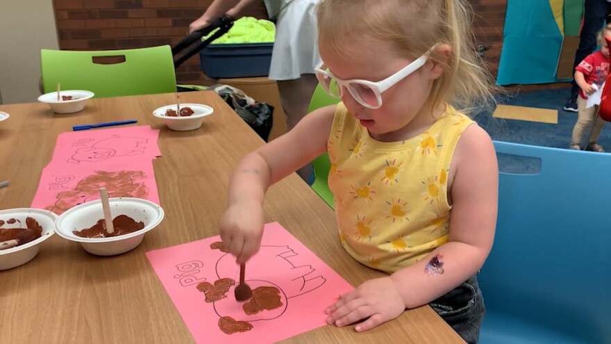 Sylvi Kolovsky, 2, loves the kids programming at the Siouxland Libraries in Sioux Falls, S.D. Her mom, RiAnna, doesn't know what kind of programming they'll have access to once they move out of town.