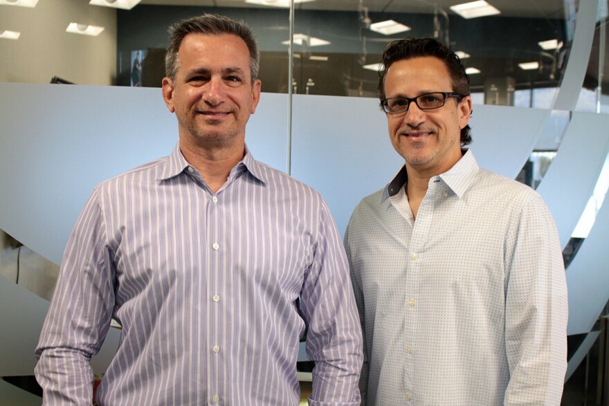 Neil Giuliano, former Tempe mayor and current president and CEO of Greater Phoenix Leadership (left) and Marcus Dell’Artino, partner at First Strategic.