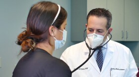 A Paycheck Protection Program loan allowed Dr. Carlos Rish to keep all his staff employed despite the economic hit his practice took from COVID-19