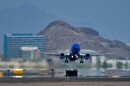 FILE - A jet takes flight as heat ripples radiate from the runway at Sky Harbor International Airport in Phoenix, on July 25, 2023. (AP Photo/Matt York, File)