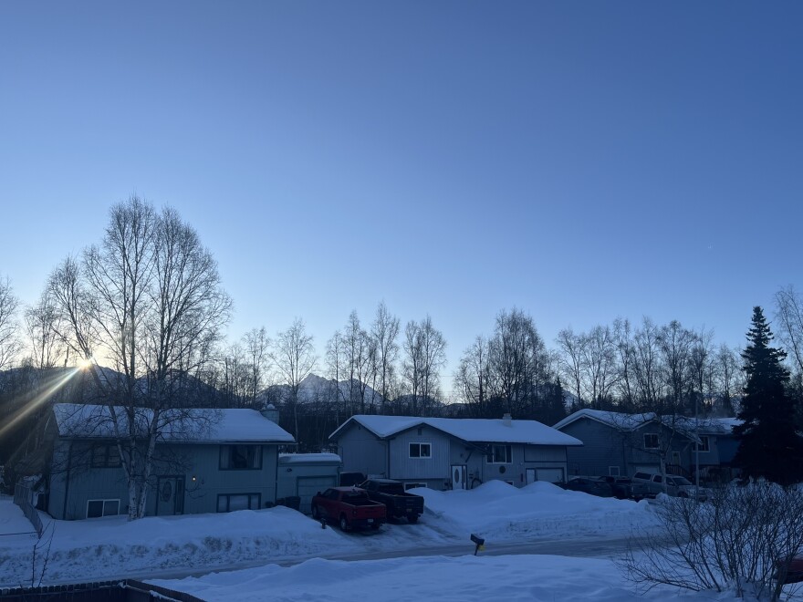 The sun rises over homes in Anchorage's Abbott Loop neighborhood on March 26, 2026.