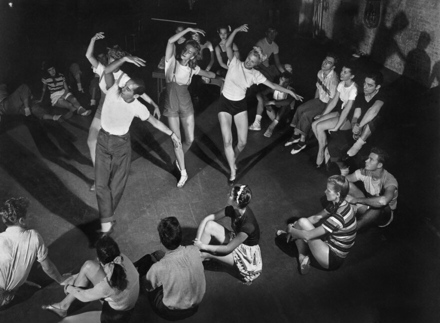 In this photo dated September 7, 1947, choreographer Jerome Robbins coaches chorus kids in ballet.