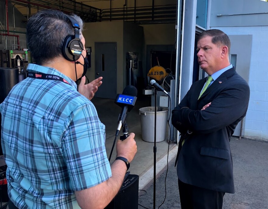 KLCC reporter Brian Bull with Labor Sec. Marty Walsh, 2021