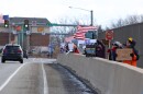 Protesters gather during Keystone's Indivisible's "Be Brave; Resist Tyranny" protest against Immigration Customs and Enforcement (ICE) on a highway overpass near Toftrees on Sunday, Jan. 11, 2026 in University Park, Pa.