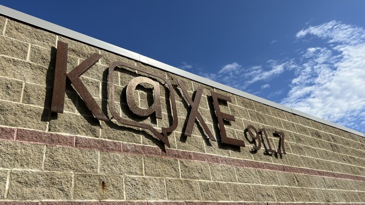 The sign on the outside of the KAXE building says KAXE 91.7