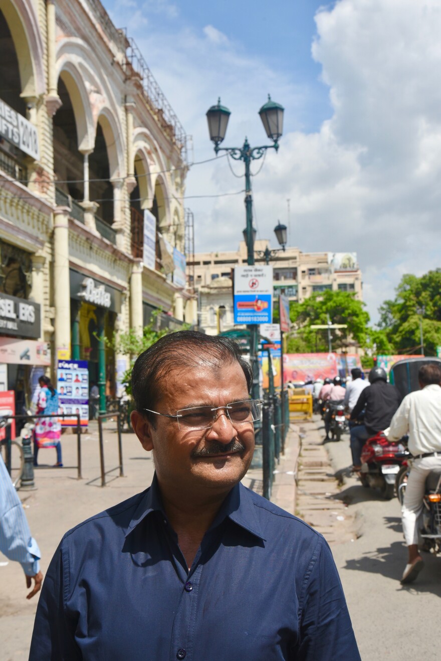 Arif Jafar stands in Lucknow's Hazratganj traffic circle, where police beat him 17 years ago. Jafar was arrested for handing out condoms to gay men.