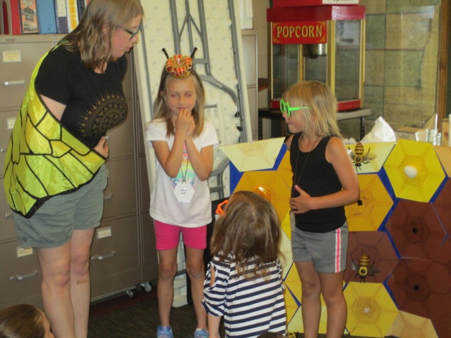 Brooke Gilley (right) leading a butterfly tagging program the kind of hands on activity she wishes she could offer during this year's BioBlitz.