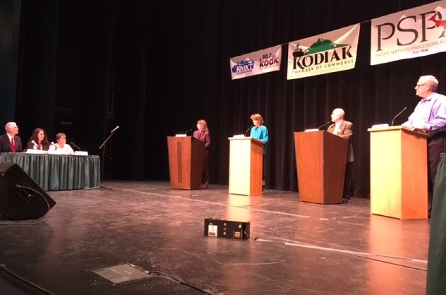 At podiums, left to right, Margaret Stock, Lisa Murkowski, Ray Metcalfe, and Breck Craig. Kayla Desroches/KMXT