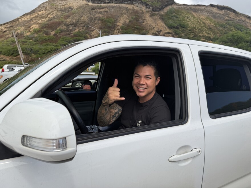 Jesse, a resident of ʻEwa on Oʻahu, pictured in his truck. (July 24, 2026)
