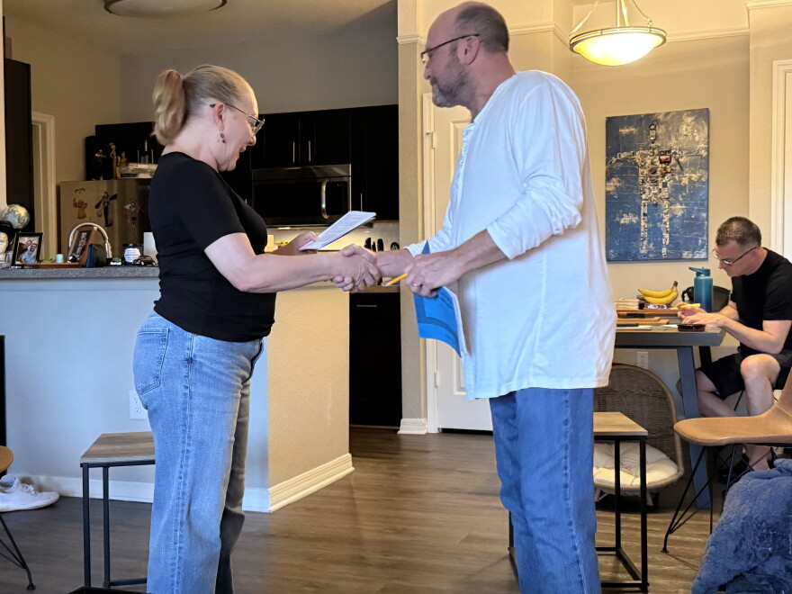 From left, actors Becky Fisher and Joe Swanberg - who are married in real life - "meet" for the first time as they rehearse the play "The Guys" with director David Lee, right.