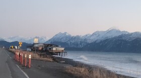 A damaged section of road on the Homer Spit.
