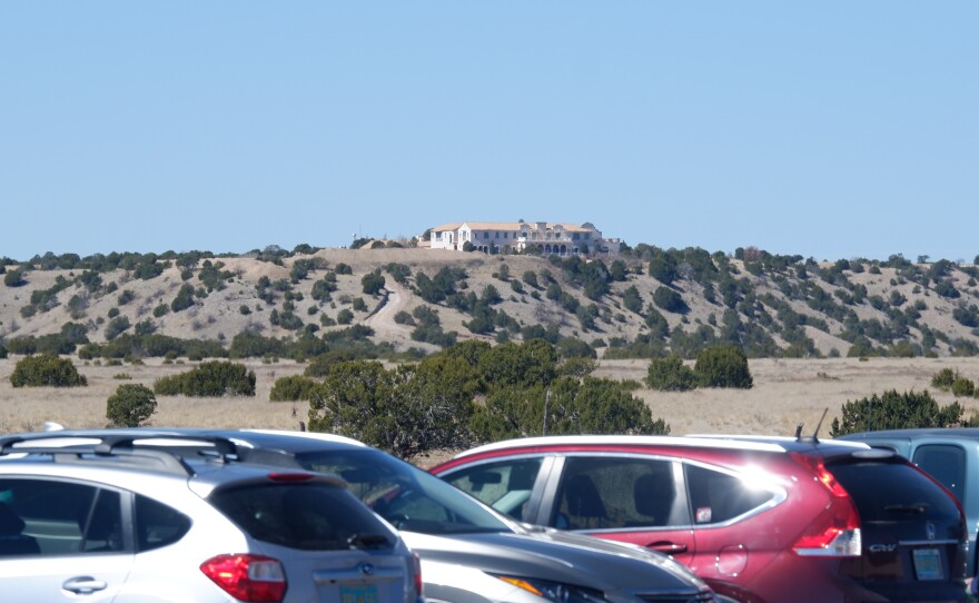 A view of Zorro Ranch from NM-41 as protesters' cars line the road