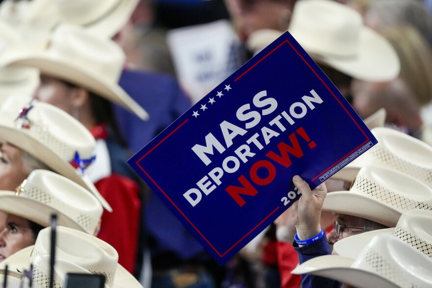 A member of the Texas delegation holds a sign during the Republican National Convention Wednesday, July 17, 2024, in Milwaukee. (AP Photo/Matt Rourke)