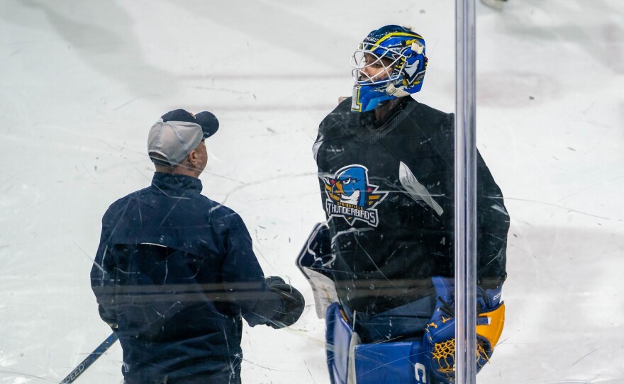 Springfield Thunderbirds Goalie Vadim Zherenko on the right with his coach Dan Stewart on the left.