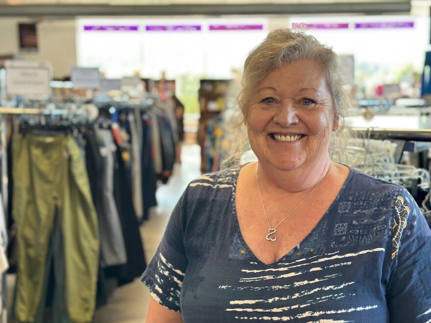 Carol Rose stands inside the WRC Thrift Store on U.S. 31 in Garfield Township. She's worked there for 40 years and is being honored by WRC for her many years of service. (Photo: Ed Ronco / IPR News)