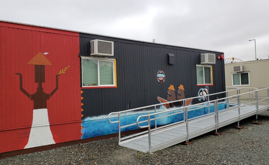 Residents are painting the exterior of each trailer in Eagle Village with Native imagery.