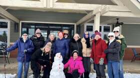 Residents of Heartwood Commons near Riverside Drive and 71st Street pose on a winter day.