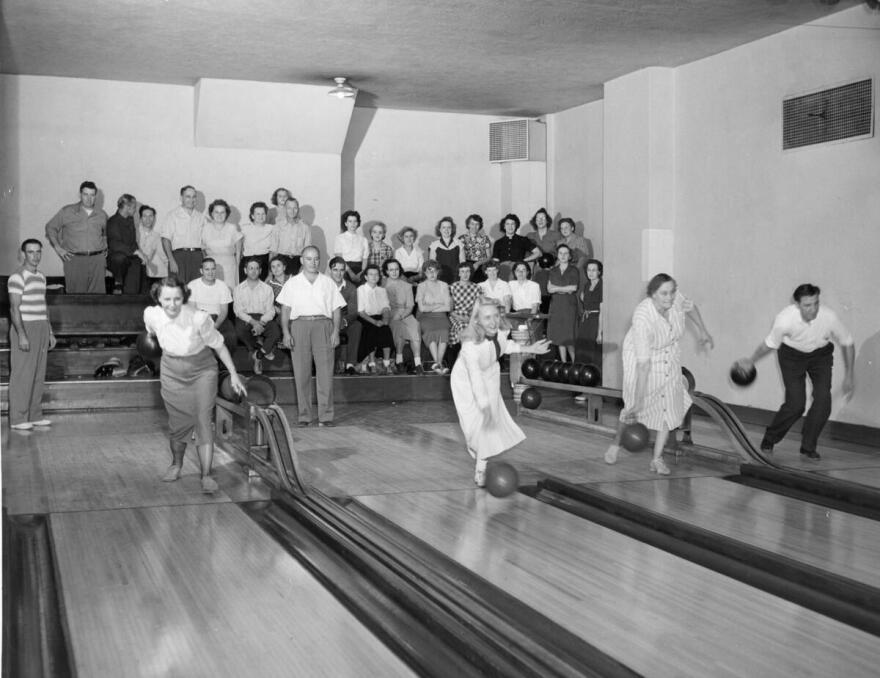 People bowling at an alley