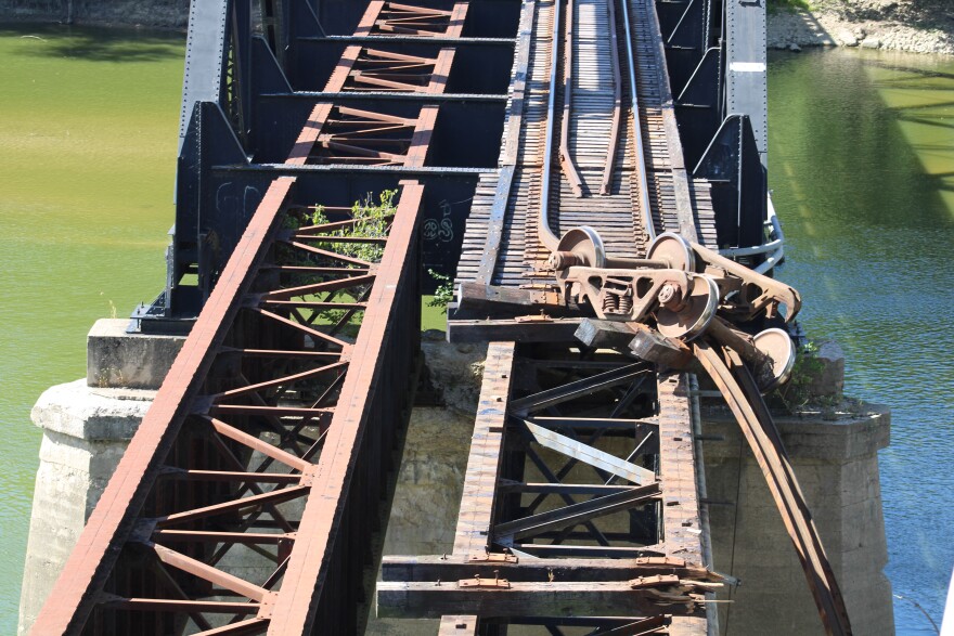  A portion of the bridge destroyed by Wednesday’s derailment (WBAA News/Ben Thorp)&#13;
