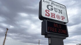 FILE - The marquee at a gun shop in Los Ranchos, N.M, flashes in protest of Gov. Michelle Lujan Grisham's order to suspend the carrying of firearms in the state's largest metro area, Sept. 11, 2023. On Monday, July 22, 2024, a federal judge ruled that New Mexico can continue to enforce a new, seven-day waiting period on gun sales while a court challenge backed by the National Rifle Association moves forward.