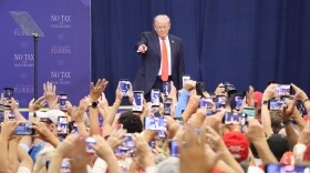President Donald Trump spoke to a cheering crowd at The Villages High School gym in Middleton in The Villages on Friday.