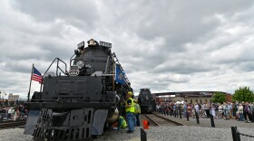 Crews work on Union Pacific's Big Boy locomotive 4014 as people watch at The Steamtown National Historic Site in Scranton.
