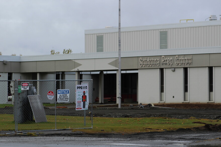 A work fence controls access to Soldotna Prep School on Tuesday, Oct. 6, 2026 in Soldotna, Alaska.