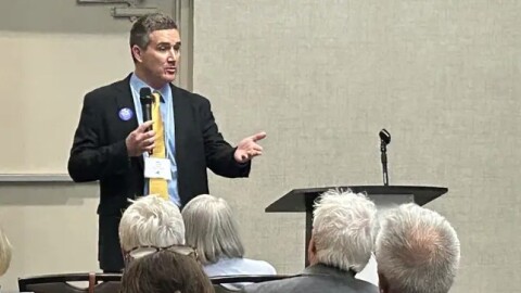 Blake Gendebien, a Democrat running for Congress in the 21st District, speaks with voters.