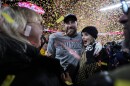Donna Kelce stands with her son Kansas City Chiefs tight end Travis Kelce and Taylor Swift after the AFC Championship NFL football game against the Buffalo Bills, Sunday, Jan. 26, 2025, in Kansas City, Missouri.