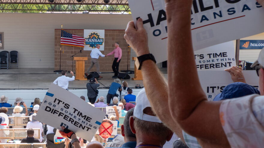 The Rev. Adam Hamilton, a Democrat, and Republican U.S. Sen. Roger Marshall appear on the debate stage on Sept. 12, 2026, at the Kansas State Fair in Hutchinson.