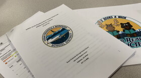 AK STAR results and other paperwork pertaining to the Kenai Peninsula Borough School District's summer reading program sit on a desk in the district's central office on Monday, May 13, 2024 in Soldotna, Alaska.