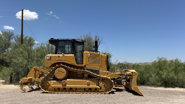 A bulldozer bearing the logo of Southwest Valley Constructors was seen near the entrance to Cottonwood Campground along the U.S-Mexico border in Big Bend National Park on Tuesday.
