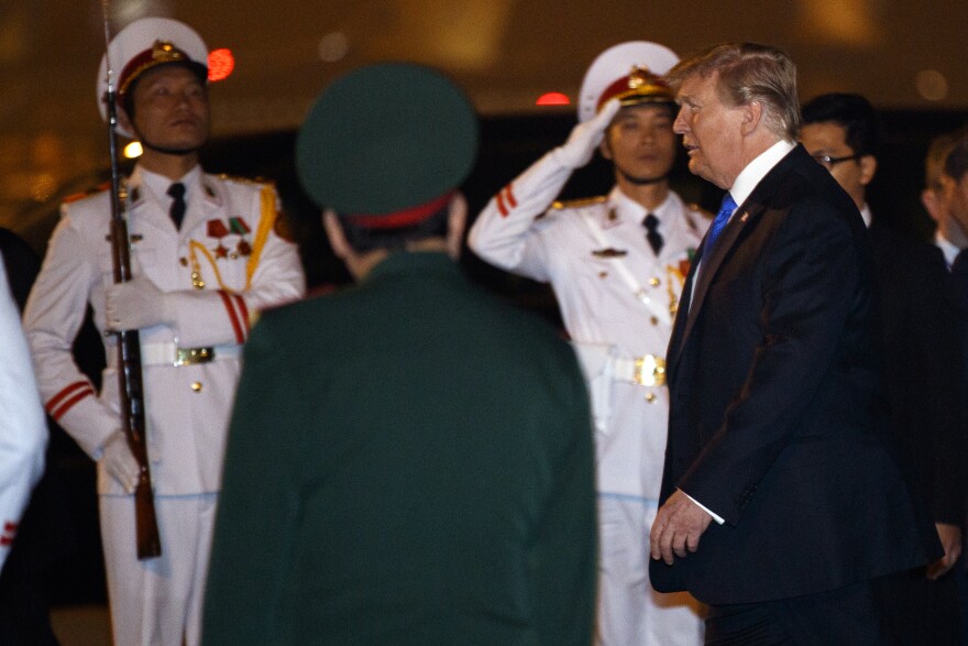 U.S President Donald Trump arrives at Noi Bai Airport before a summit with North Korean leader Kim Jong Un, Tuesday, Feb. 26, 2019, in Hanoi. 
