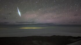 A brilliant Geminid fireball over the island of Hawai‘i on December 13, 2020.