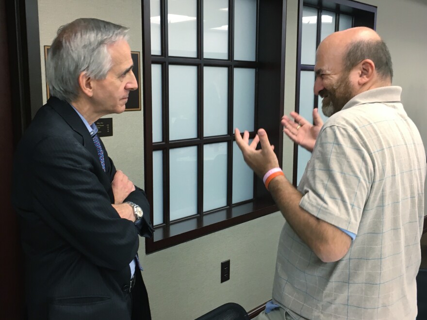 James Meadours, right, speaks with prosecutor Robert Laurino at a summit in New Jersey. In 1993, Laurino won a groundbreaking sexual assault case where the victim had an intellectual disability.