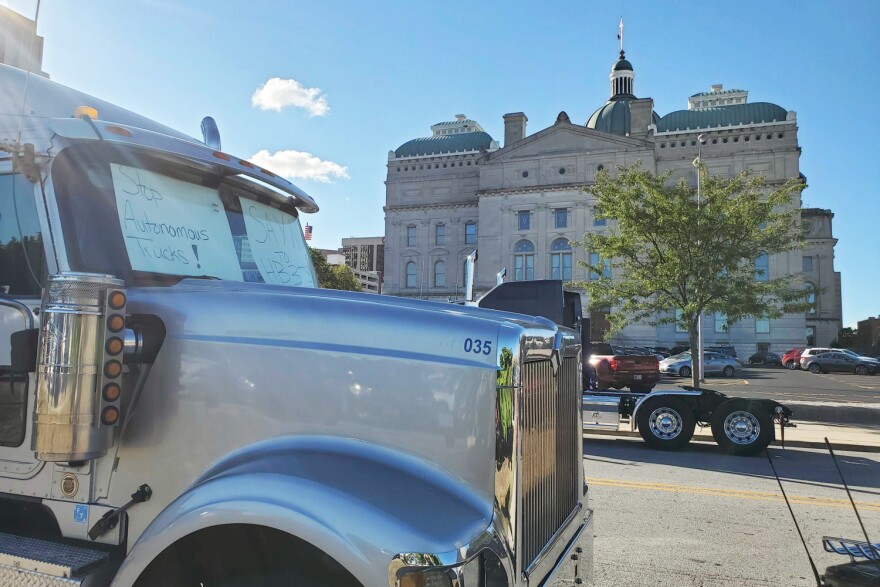 Commercial drivers parked trucks in front of the Statehouse to protest future autonomous vehicle legislation.